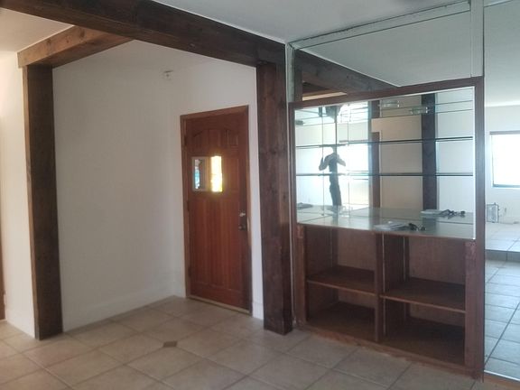 Living room and entrance area.