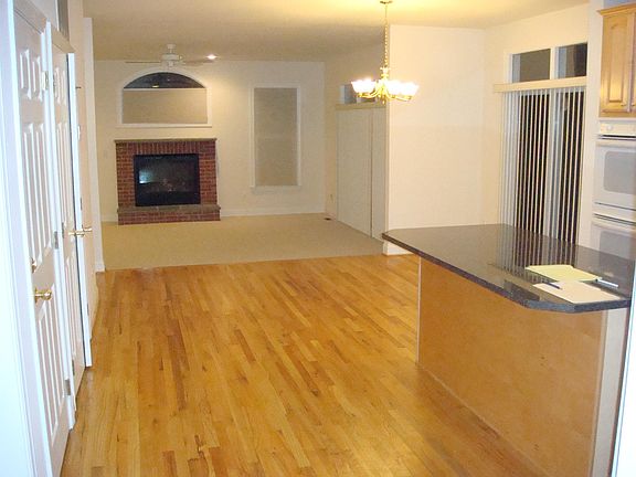 View of Breakfast Area and Den from Kitchen