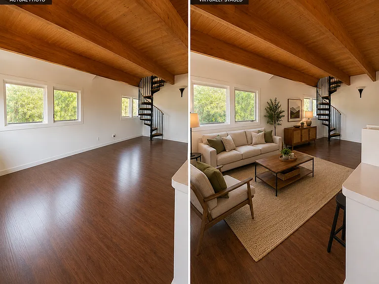 An expansive open-concept living area showcasing warm exposed wood beams and abundant natural light.