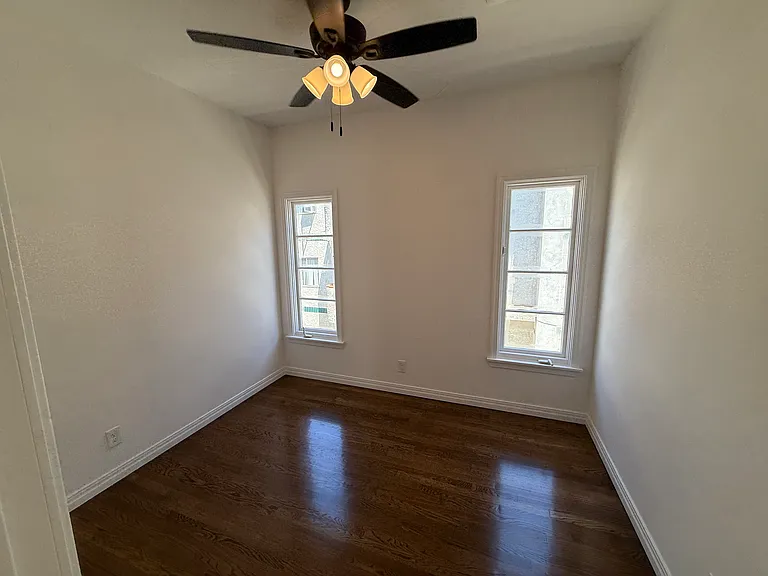 Bedroom#1 - Ceiling Fan and East Facing New Wood Windows