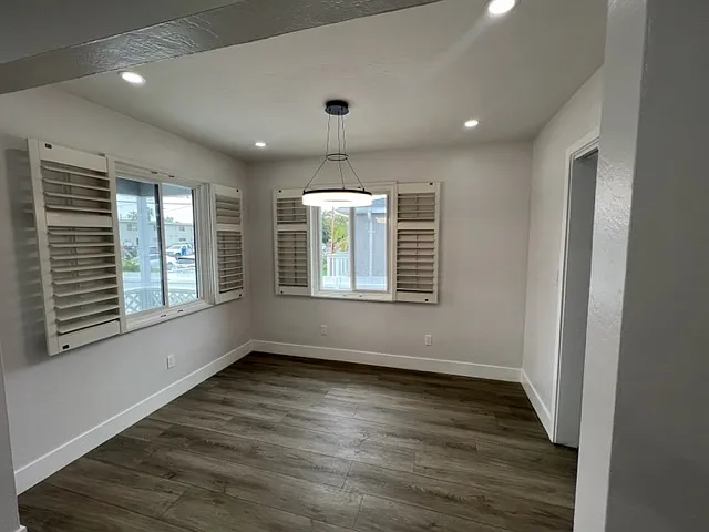 Dedicated dining room with plantation shutters