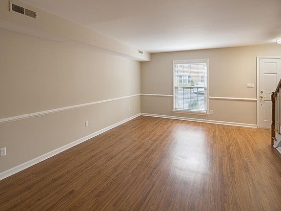 Large living room with new flooring!  Huge storage closet un