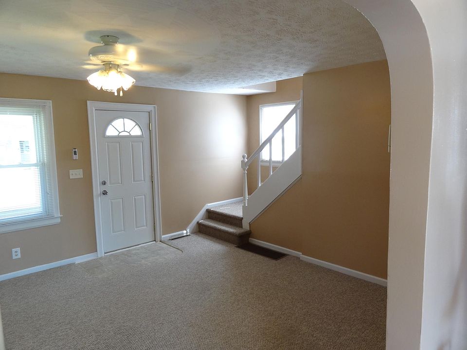 Living Room (Prior to new paint and hardwood floors)