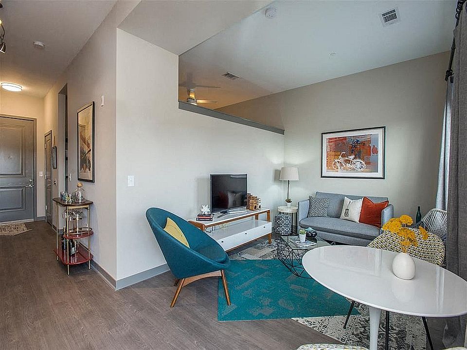 Experience the charm of this chic urban living room, designed for relaxation and style.