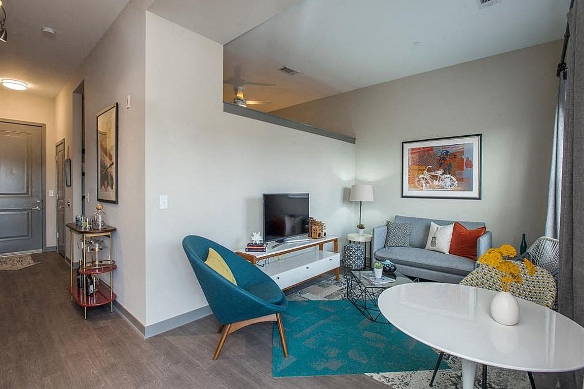 Experience the charm of this chic urban living room, designed for relaxation and style.