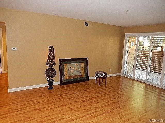 Spacious Living Room with Slider to Patio, Wood Floors, Upgraded