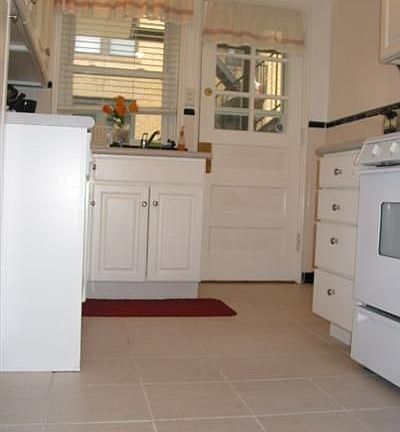Custom Cabinetry and Balcony off Kitchen