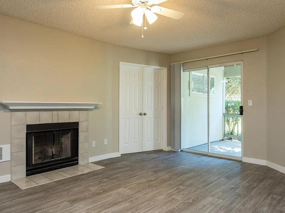 Two Bedroom Den | Living Room with Fireplace