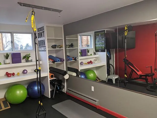 Dedicated gym with proper mat flooring and mirrors.