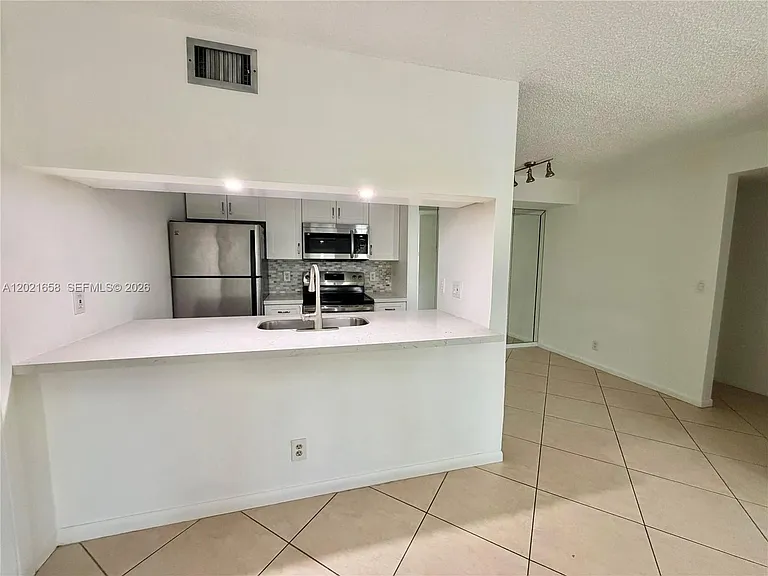 7137 Golf Colony Ct #202 — Photo 1