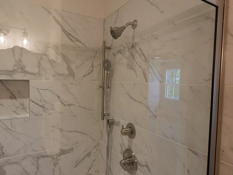 Master Tiled Upgraded Shower with multiple shower heads