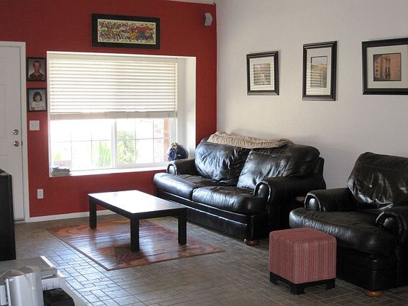 Open living room-vaulted ceilings-dimmable lights and lots of ceiling fans