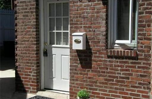 Brick entrance with new doors