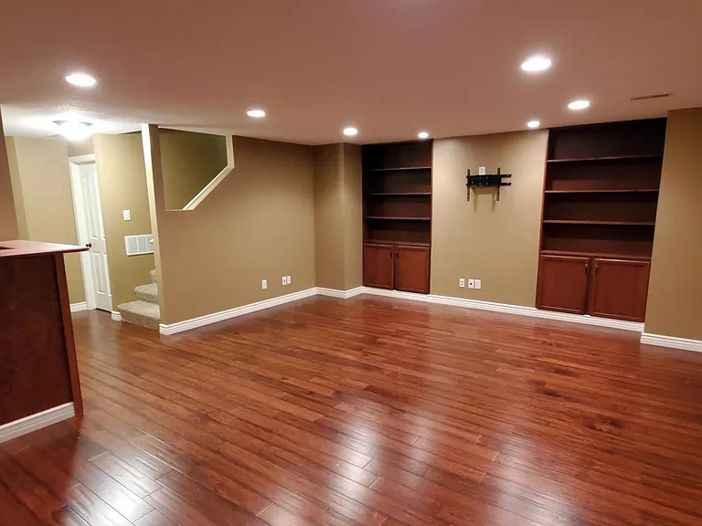 Basement living room with bar