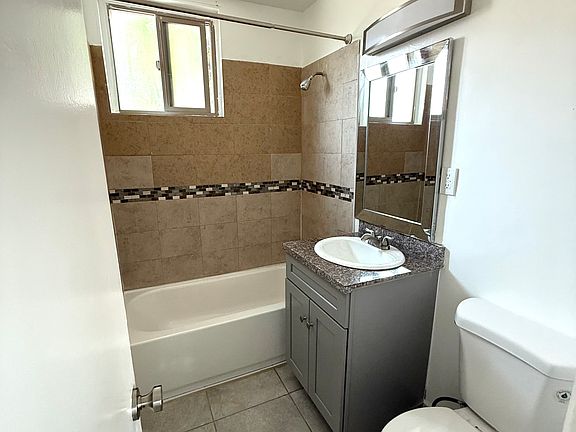 4th image of 8619 Belford Ave APT 10