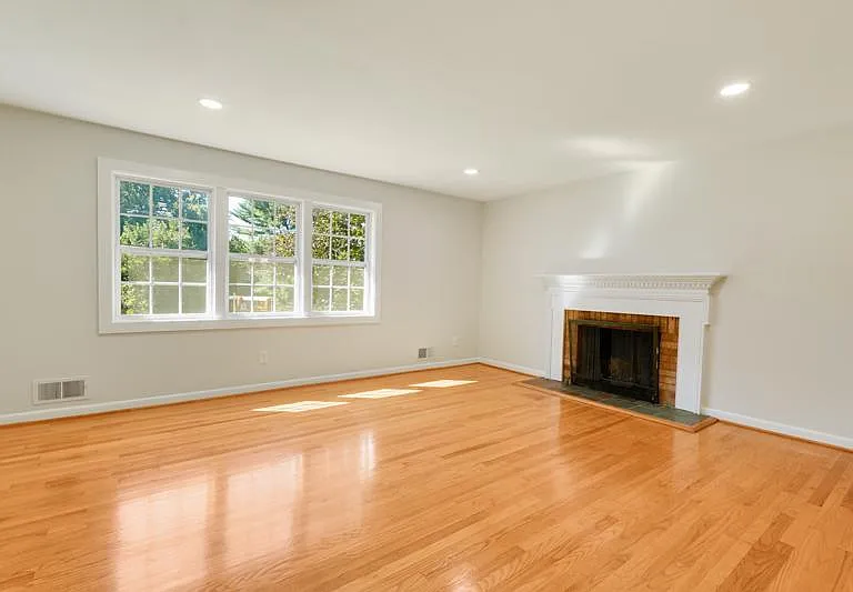 Upper Living Room with wood-burning Fireplace