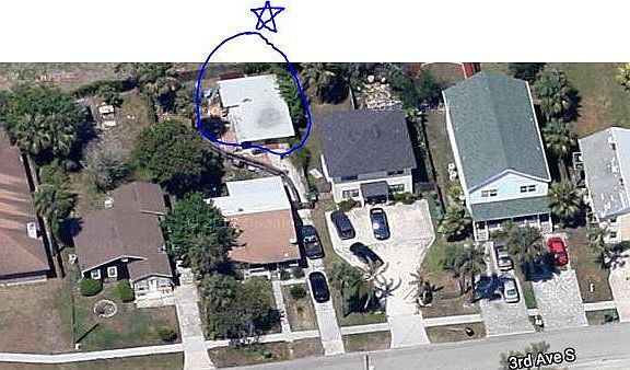 small house in back.  parking access via grassy alley enteri