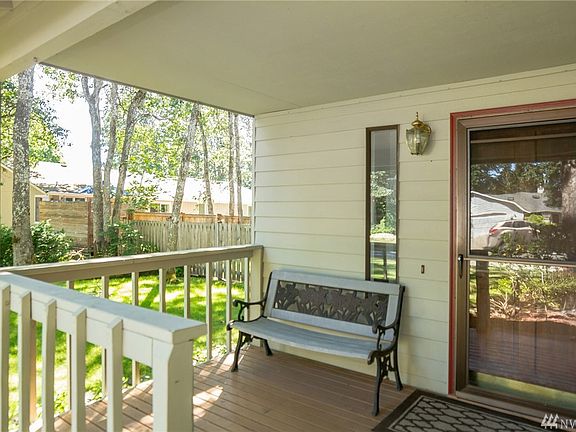 Covered front porch welcomes you home.