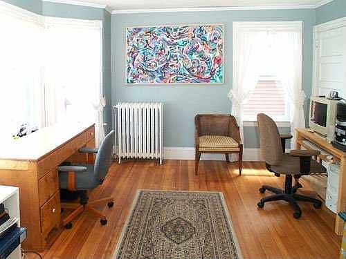 Bay window in upstairs bedroom/office provides lots of light. Two closets!