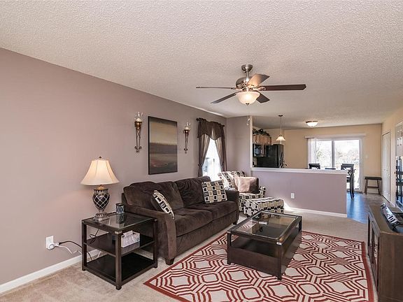 Large Living Room with ceiling fan.