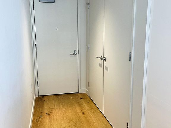Wide front hallway and utility closet