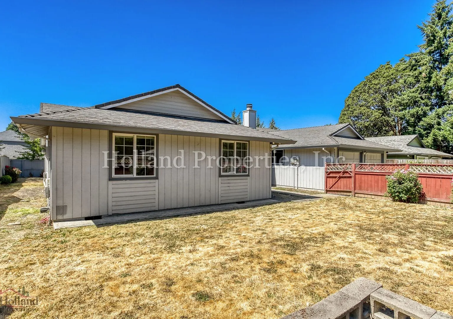 Charming Single-Level Duplex with Fireplace, Fenced Yard & Detached Garage — Photo 3