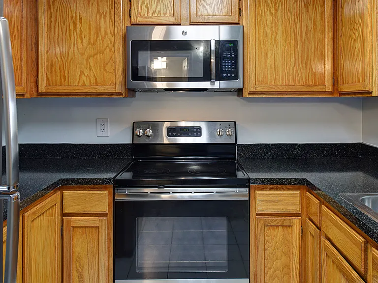 Kitchen features stainless steel appliances