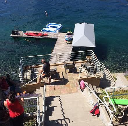 Photo of lower stairs leading to lower patio and dock.