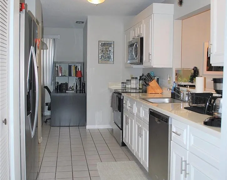 9867 NW 1st Ct — Photo 3