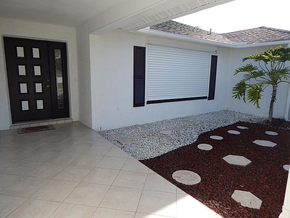 ENTRANCE (with storm shutters)