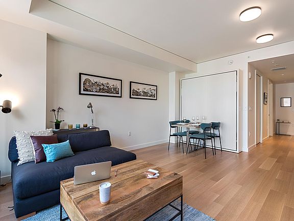 Living room with table down (murphy bed up).