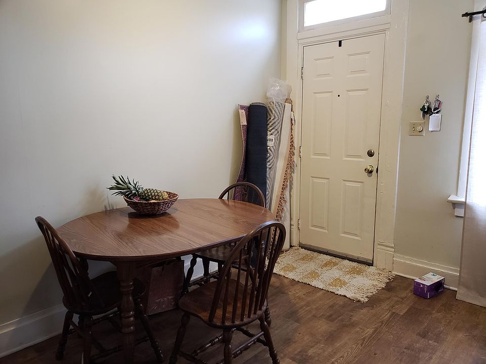 Eat-in Kitchen. Kitchen table and backdoor.