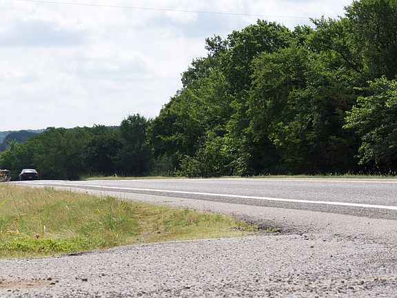 left of the driveway