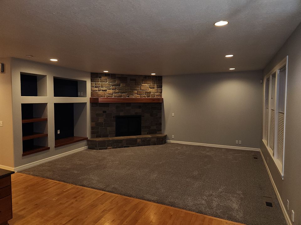 Family room with natural gas fireplace.