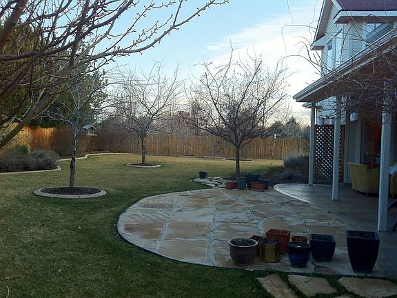 Beautifully landscaped yard with patio