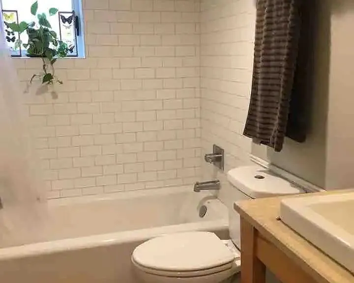 Your bathroom includes a full bathtub.