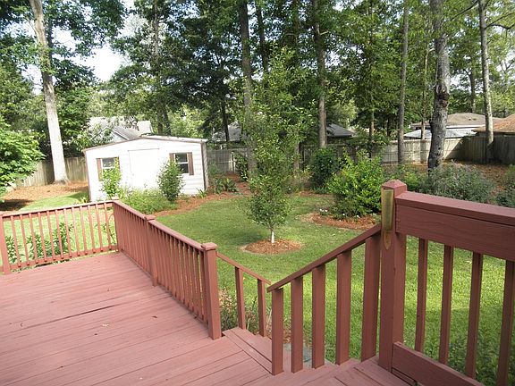 Deck in backyard.  Shed