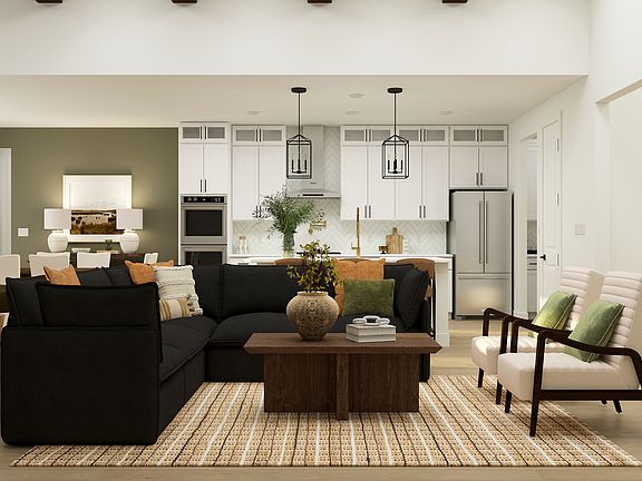 The open living spaces on the main floor connect the kitchen, living room and dining room.