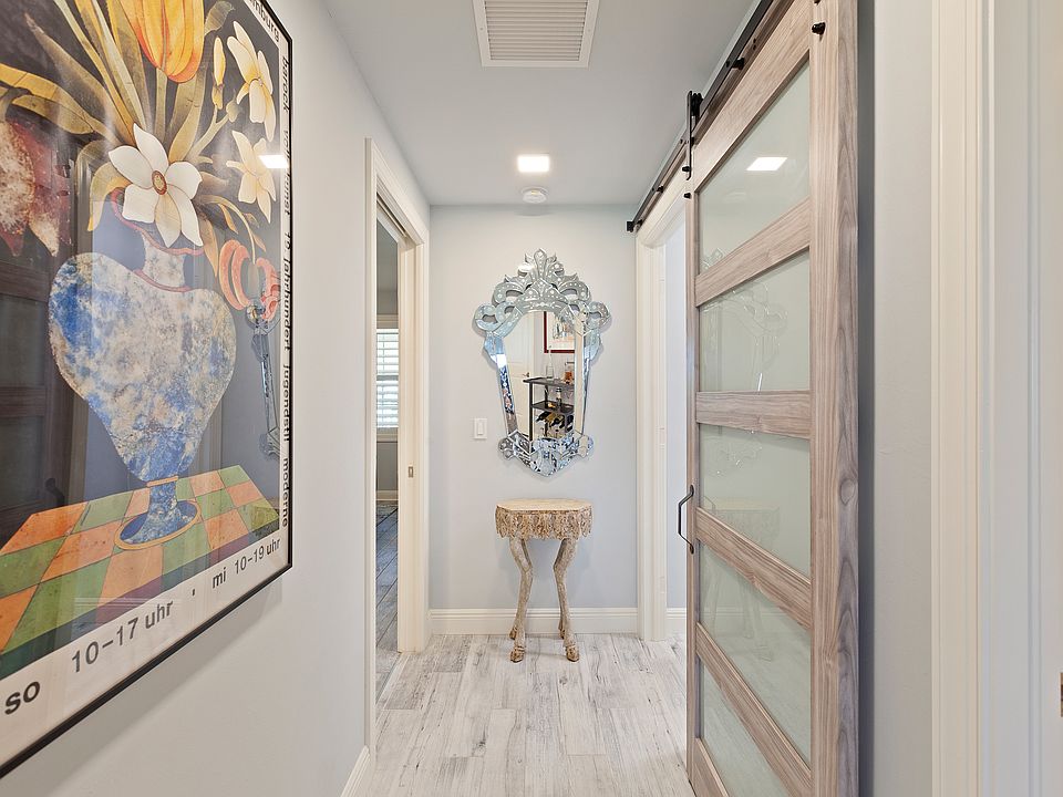 Hallway to guest bedroom and walk in pantry