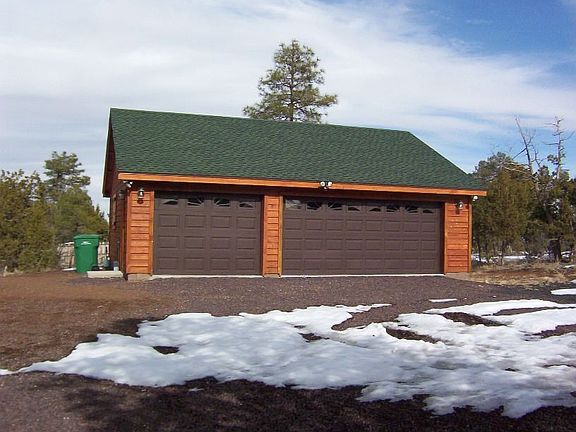 In addition to the attached garage there is a 3 car detached garage/workshop