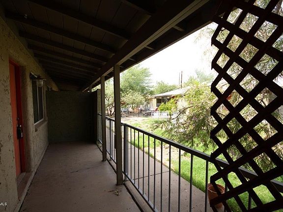 Covered, Fenced Front Porch