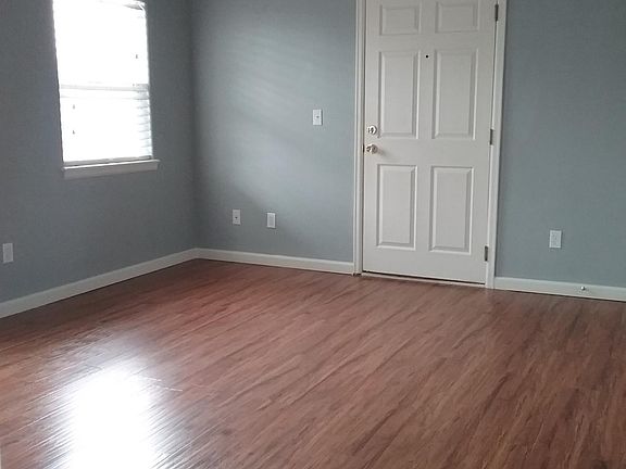 Spacious living room - CARPET on dinning, living room and hallway (This picture shows an identical unit without carpet)
