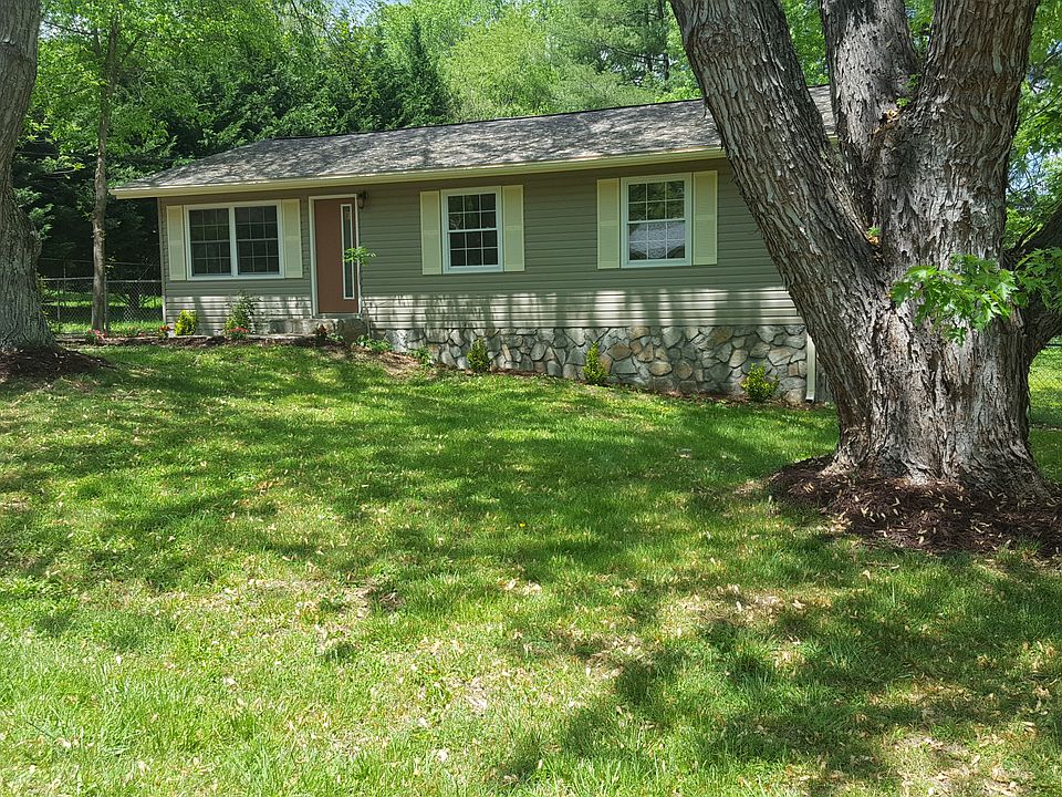 Front with shade trees