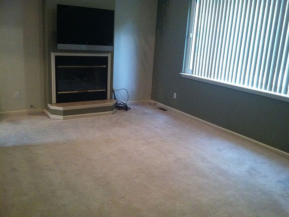  48 inch LG TV above the fireplace
