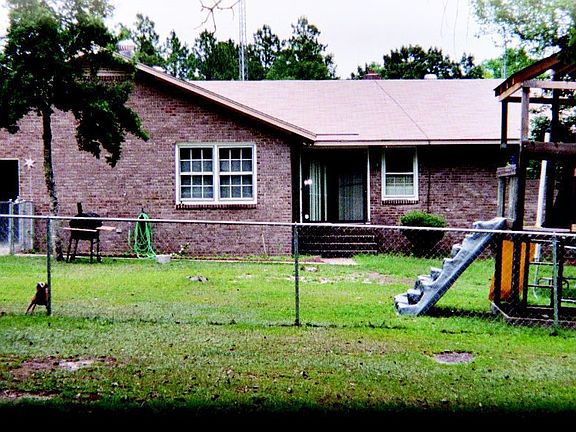 side view of fenced-in yard