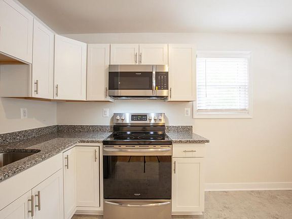 New smooth surface electric range and microwave