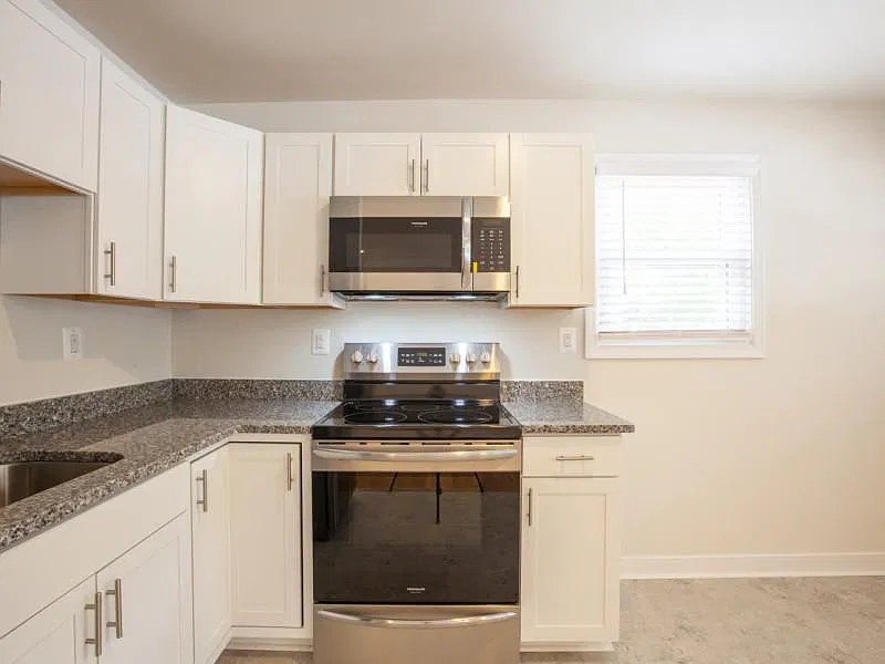 New smooth surface electric range and microwave