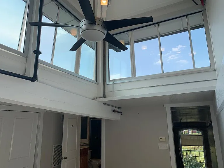 Clear story windows in bedroom