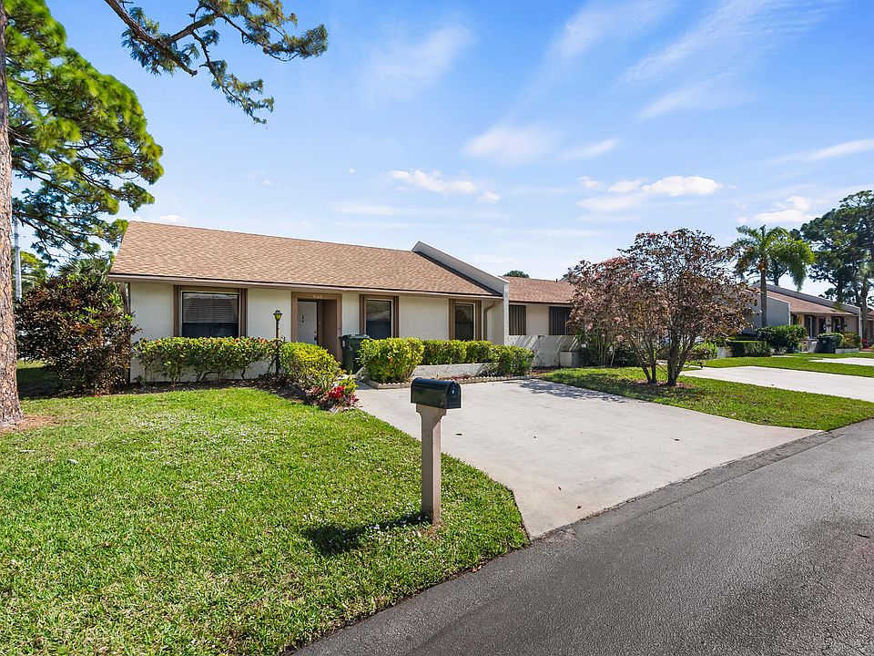 Home For Sale In VILLAGES OF WOODLAKE
