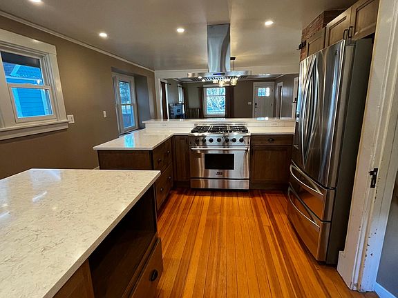 Kitchen looking in to dining and living space
